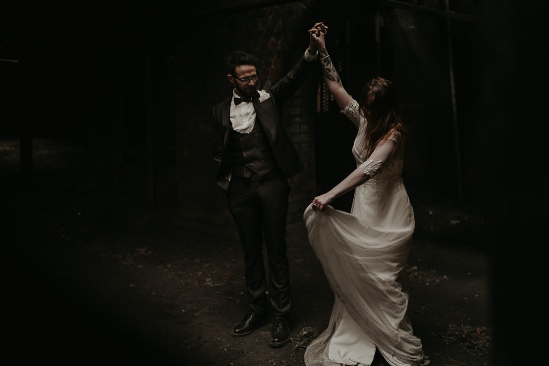 Couple dancing in dramatic Mining Museum wedding venue - scottish elopement photographer