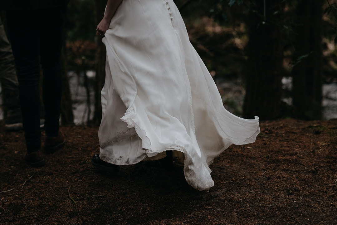 Beautiful windy wedding dress in Scottish elopement