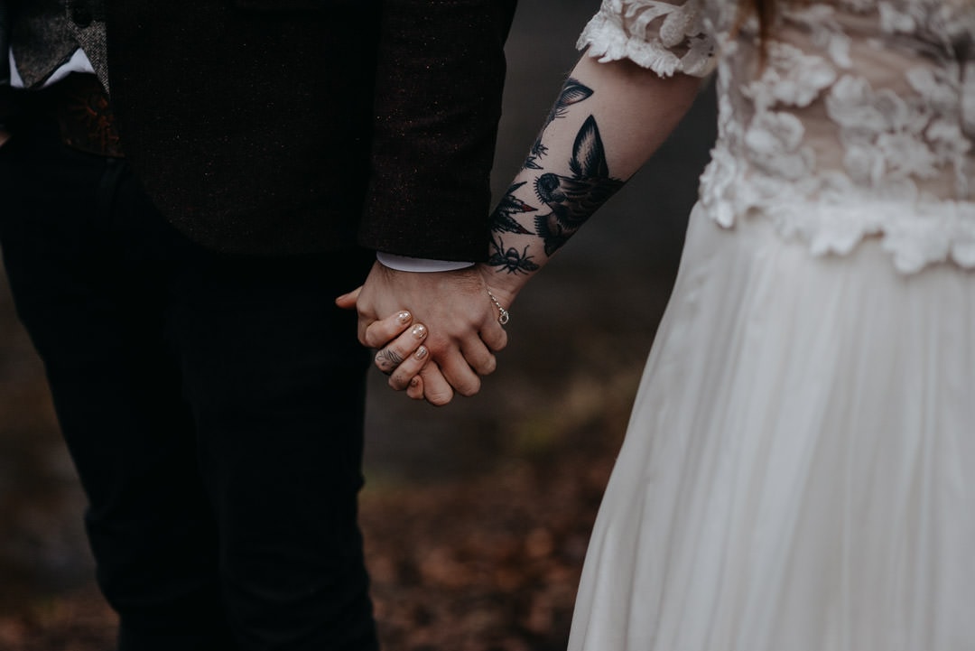 Adventurous tattooed couple in Scottish elopement
