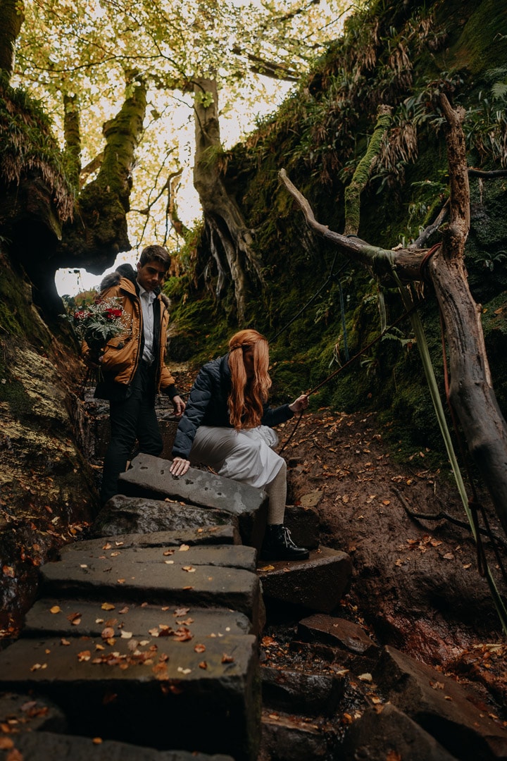 devil's pulpit elopement ceremony - rock climbing down gorge