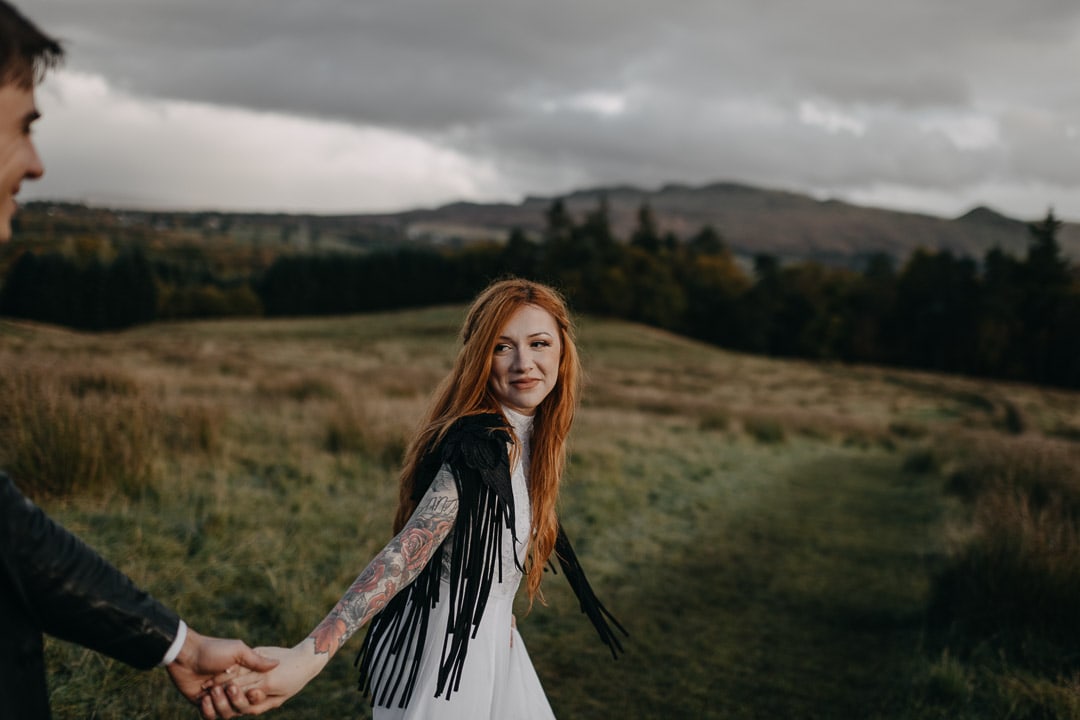 Rock n roll tattooed bride in adventurous Scotland elopement