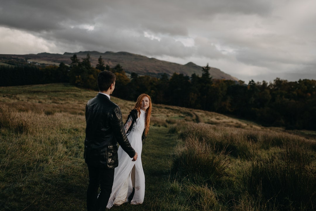 Rock n roll tattooed bride in adventurous Scotland elopement - dancing