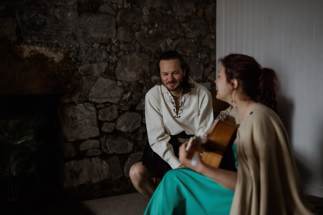 Isle of Mull elopement couple playing guitar together