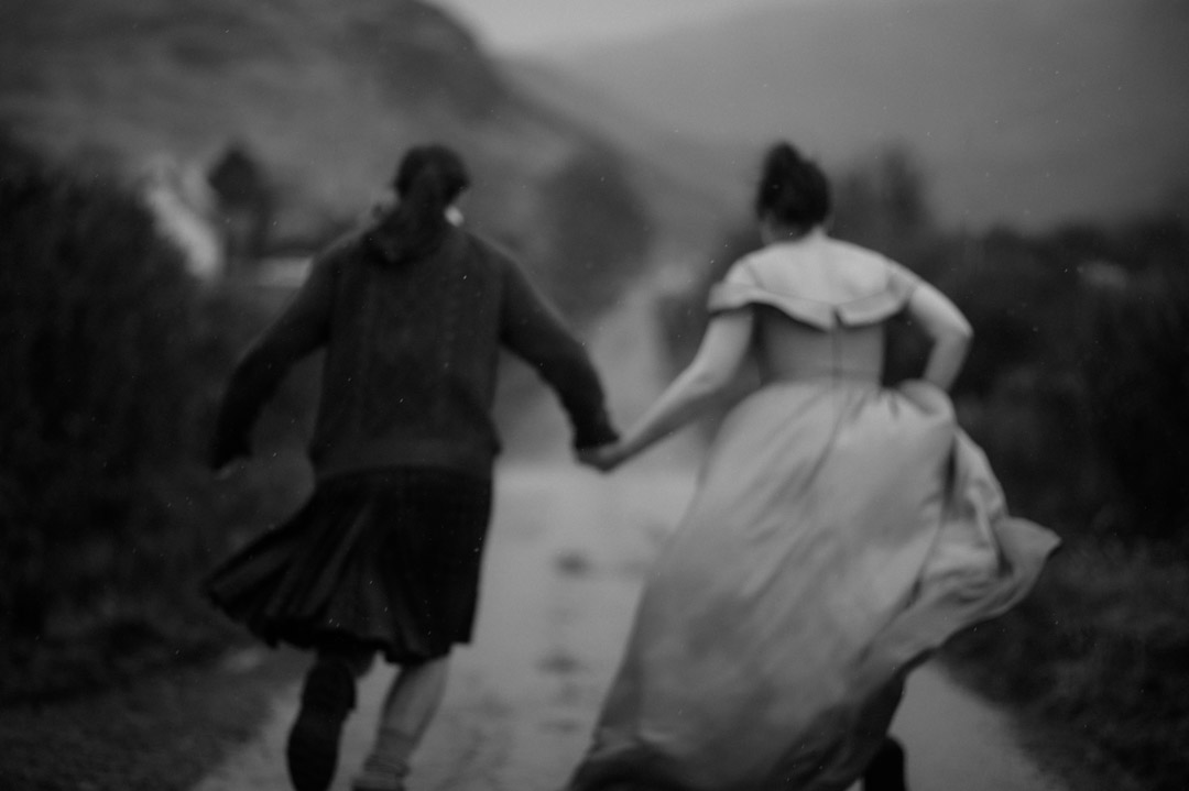 Inner Hebrides elopement couple dancing in the rain