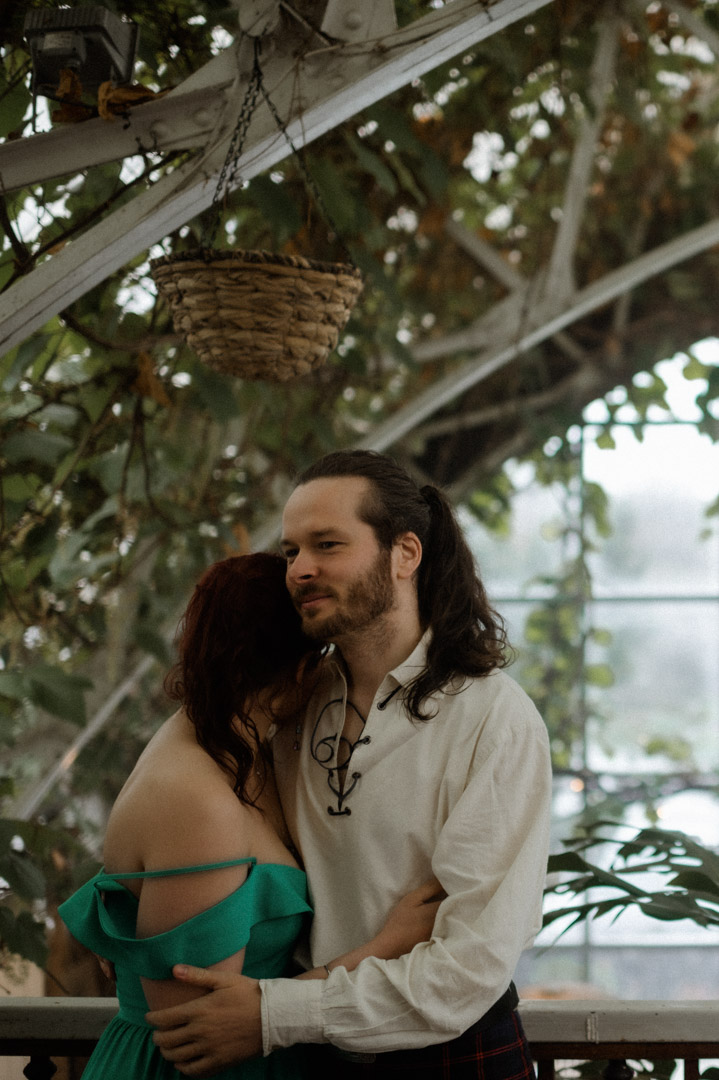 Isle of Mull cheese cafe couple cuddling after elopement
