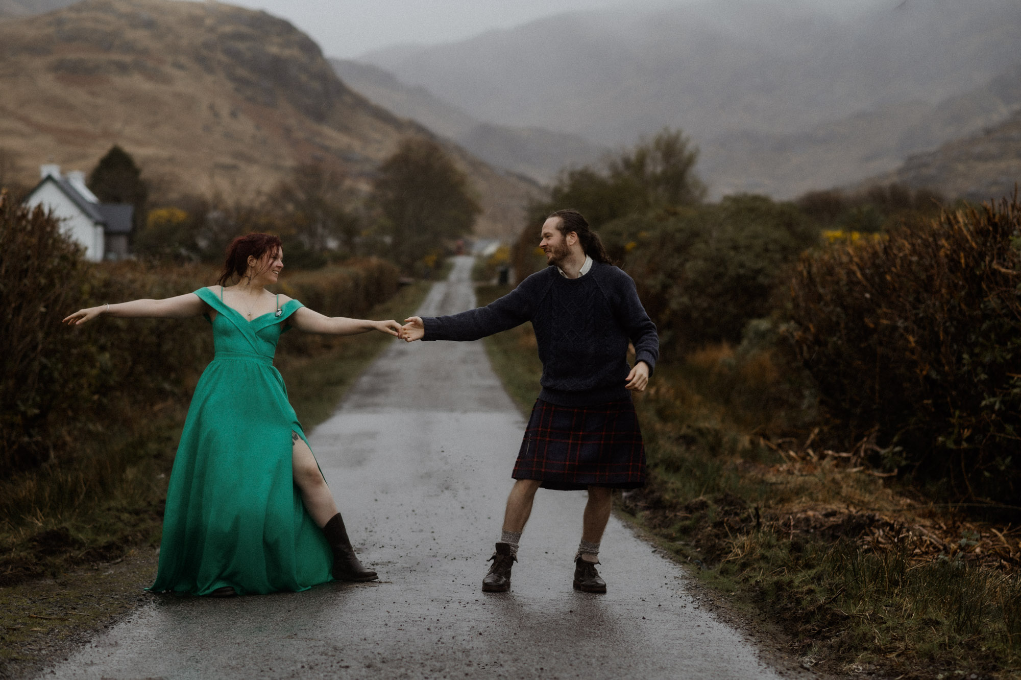 Isle of Mull dancing in the rain - elopement couple