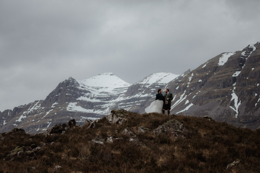 Walking in hills during elopement in Scotland