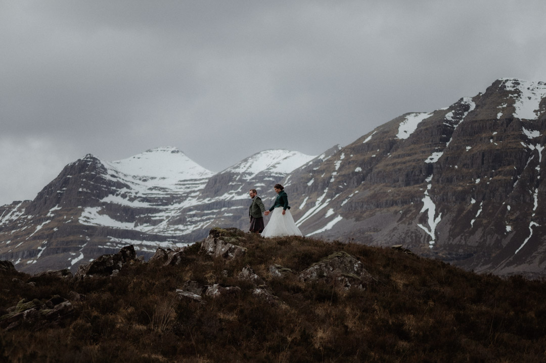 Walking in hills during elopement in Scotland