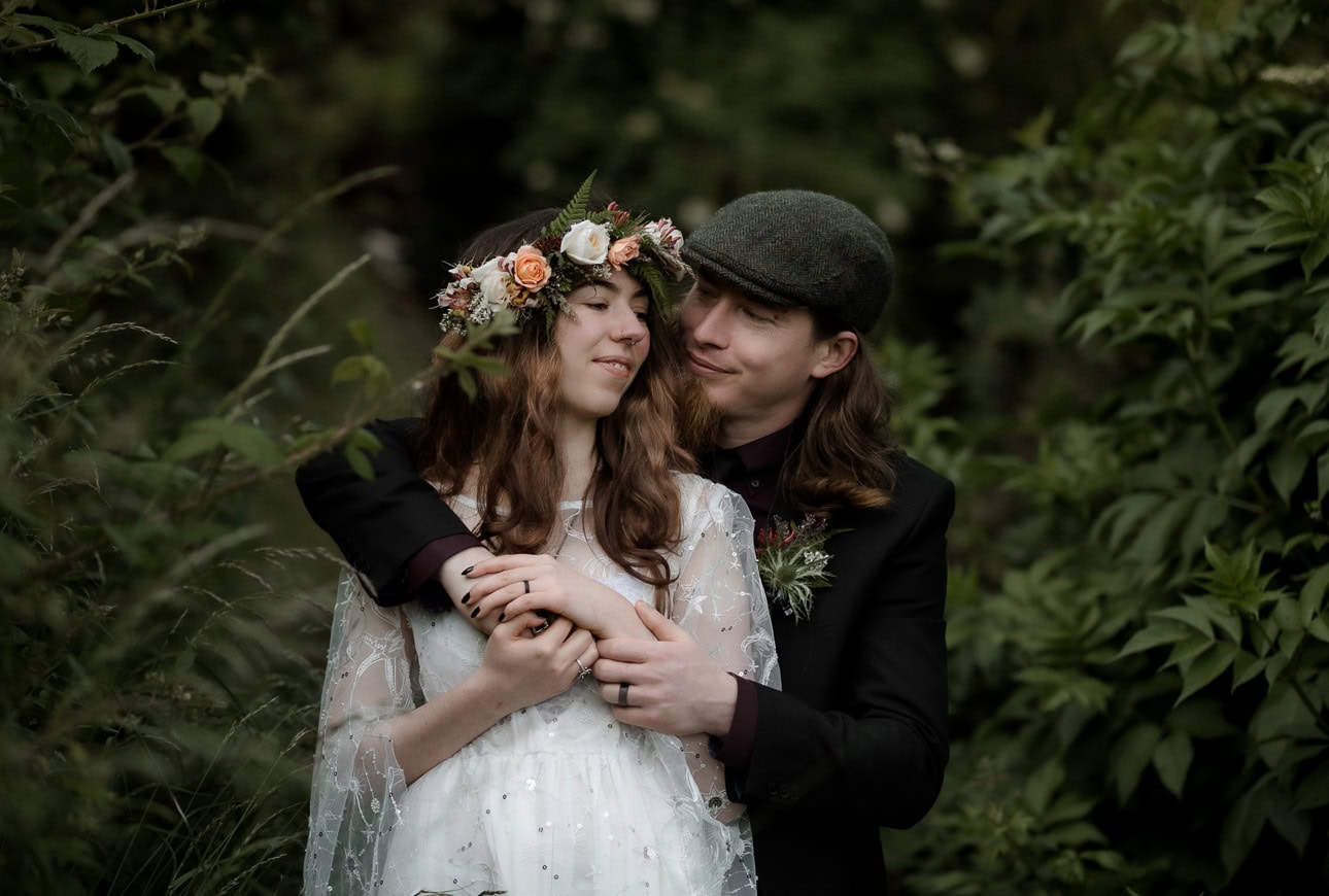 pagan solstice elopement in Edinburgh - couple snuggling
